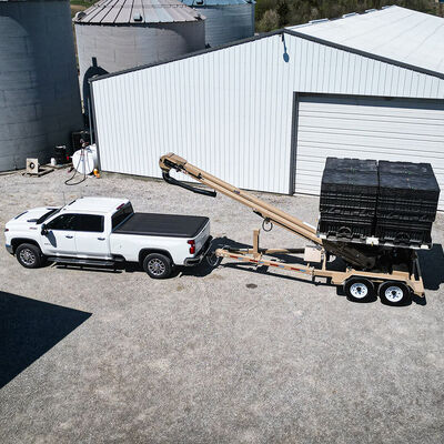 Unverferth Seed Pro seed tender with four bulk seed boxes ready for planting